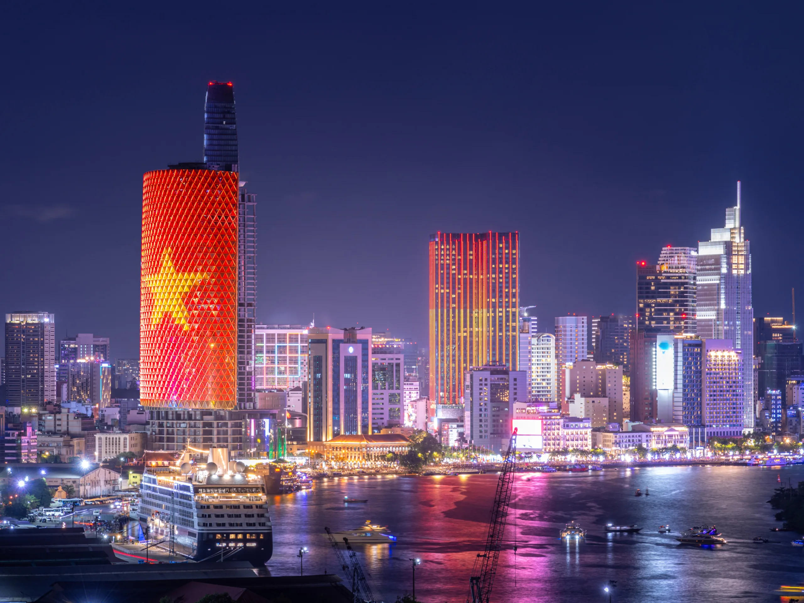 Aerial view of Ho Chi Minh City skyline and skyscrapers on Saigon river