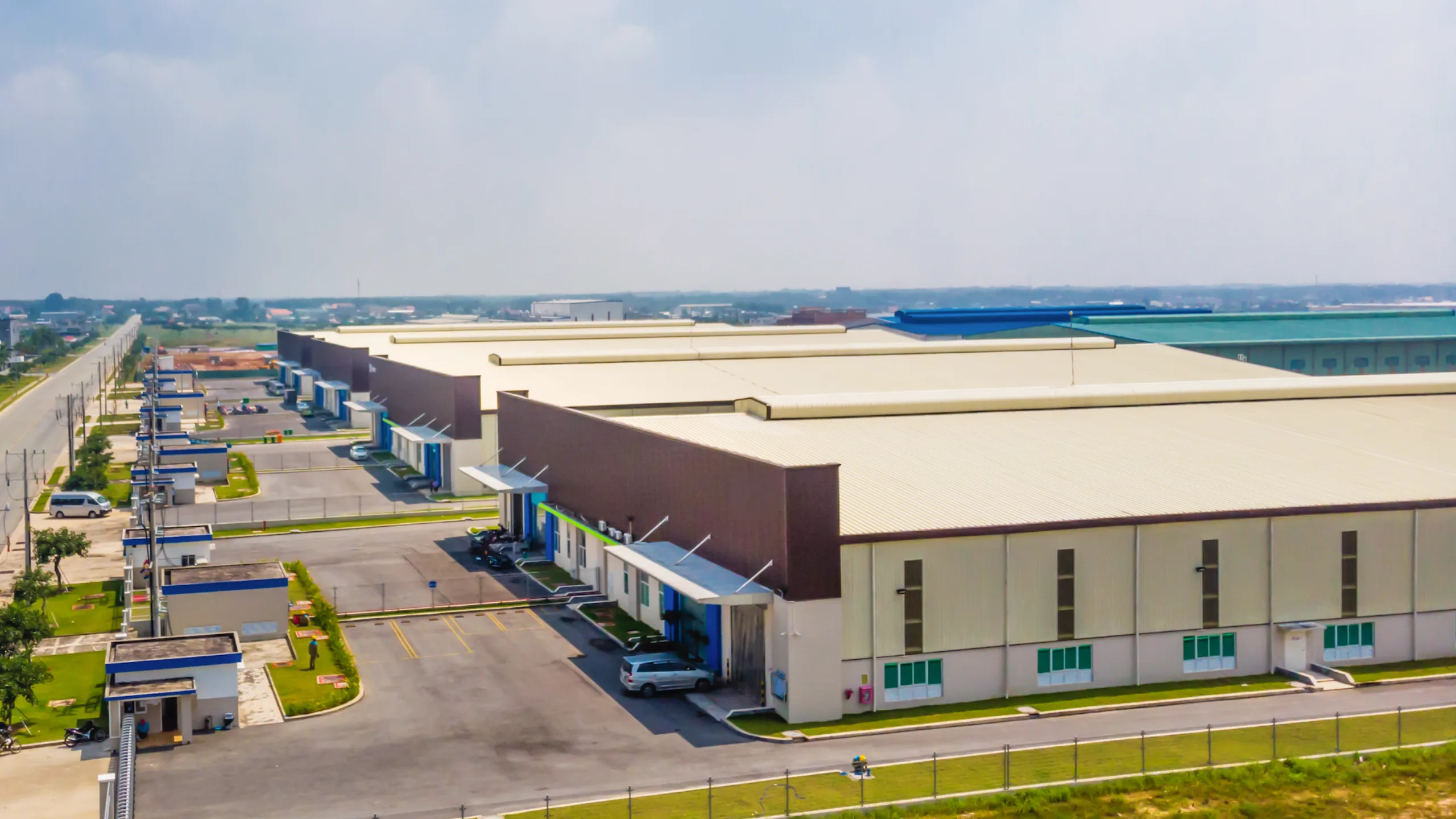 Industrial building with a spacious parking lot